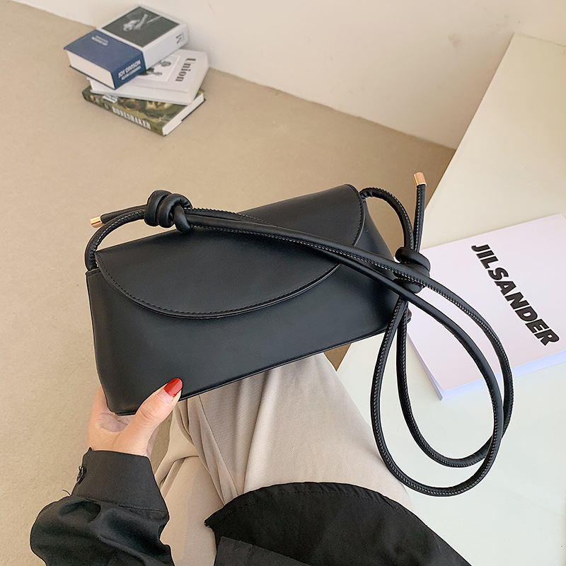 The Knot Curve Shoulder Bag