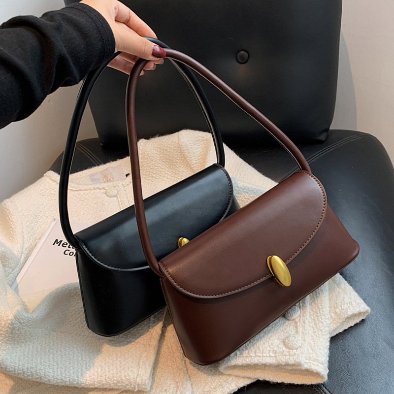 The Elise Oval Clasp Shoulder Bag